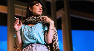 Sharon (Susi Damilano) begins to get into the spirit of her French Rosetta Stone lessons.