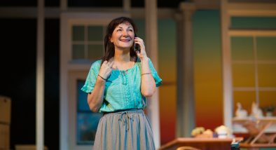 Sharon (Susi Damilano) makes a phone call to her son.