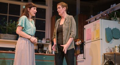 Sharon (Susi Damilano) and Robyn (Julia Brothers) work through a dispute.