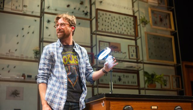 Jeff (Lucas Verbrugghe) examines an insect specimen.