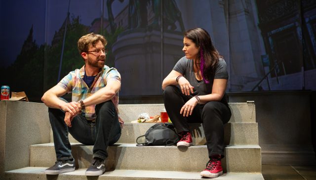 Entomologists Jeff (Lucas Verbrugghe) and Betty (Lori Prince) eat lunch on the steps of the Natural History Museum.