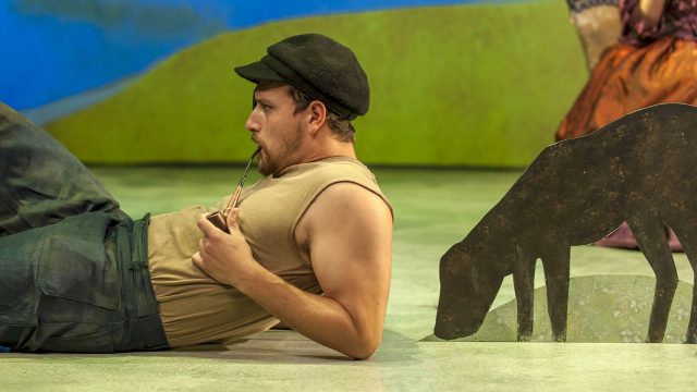 The Boatman (Xander Ritchey) poses for George's painting.