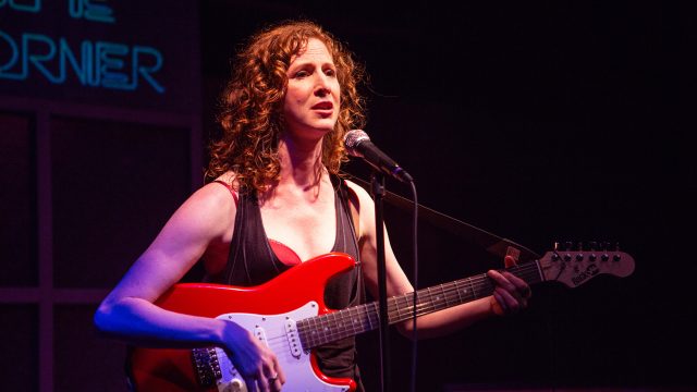 Kate (Jessica Bates*) performs at a local bar after work. Photo by Jessica Palopoli.