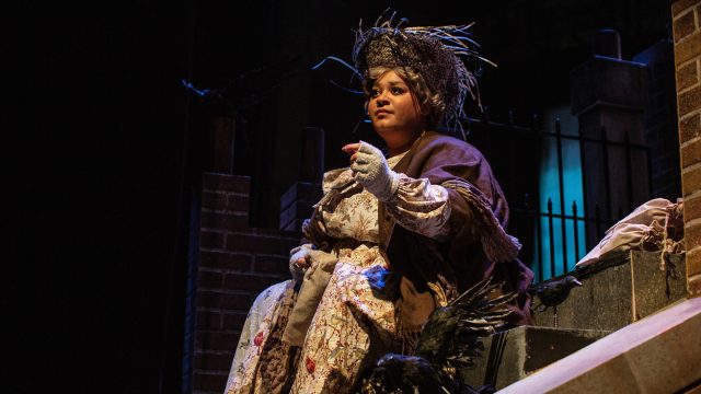 Bird Woman (Katrina Lauren McGraw*) feeds the birds.