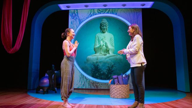 Joan (Susi Damilano*) seeks advice from L.A. yoga expert Romola (Ayelet Firstenberg*).