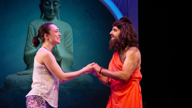 Romola (Ayelet Firstenberg*) is stunned to meet Gururaj (Bobak Cyrus Bakhtiari*).