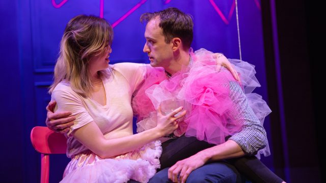 Best friends Laura (Ruibo Qian*) and Jordan (Kyle Cameron*) share a moment and joke about getting married.