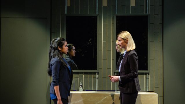 Sakina (Avanthika Srinivasan*) meets Marcia (Arwen Anderson*) in the ladies' room to discuss strategy.