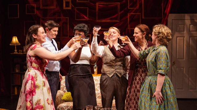 Members of the Daughters of Bilitis toast their first meeting. L-R:E velyn (Olivia Levine), Griff (Molly Shaiken), Vivian (Jeunée Simon), Shorty (Em Lee Reaves), Mal (Katie Rubin), and Peggy (Erin Anderson).