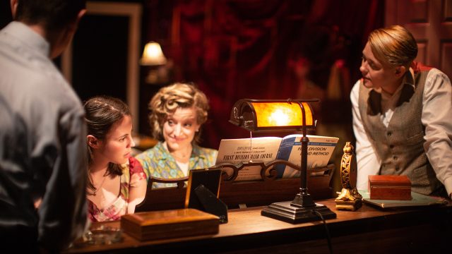 Peggy (Erin Anderson, center) plays a song for Evelyn (Olivia Levine) and Shorty (Em Lee Reaves).