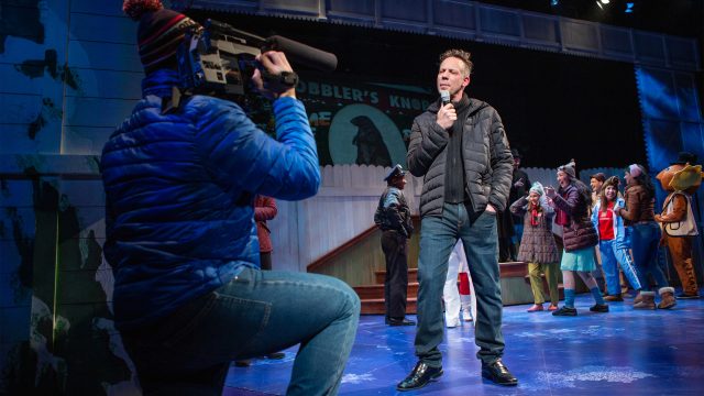 Phil Connors (Ryan Drummond*) gets ready to report on the Groundhog Day festivities in Punxsutawney, PA.