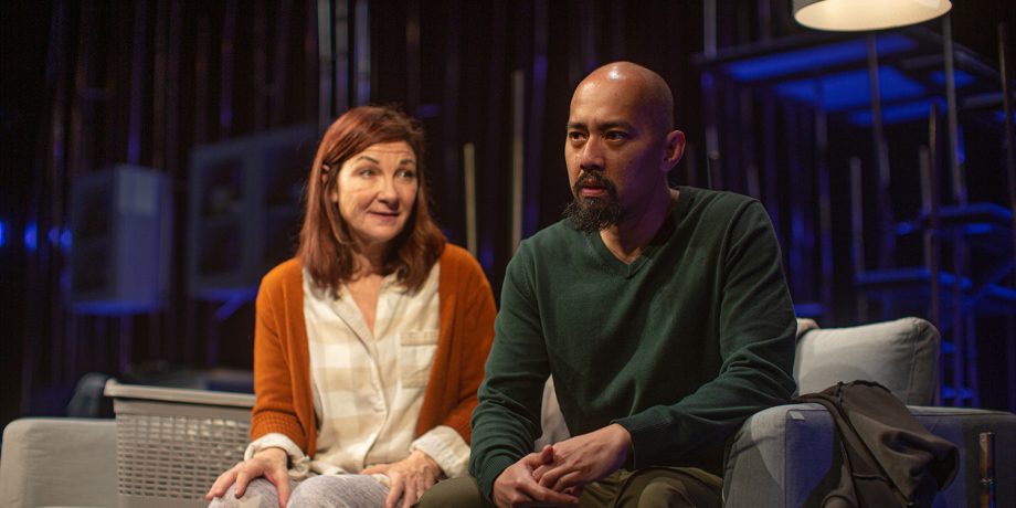 Sugar (Susi Damilano) is touched as she takes in Letter Writer #3's (Jomar Tagatac) story in 'Tiny Beautiful Things' at San Francisco Playhouse.