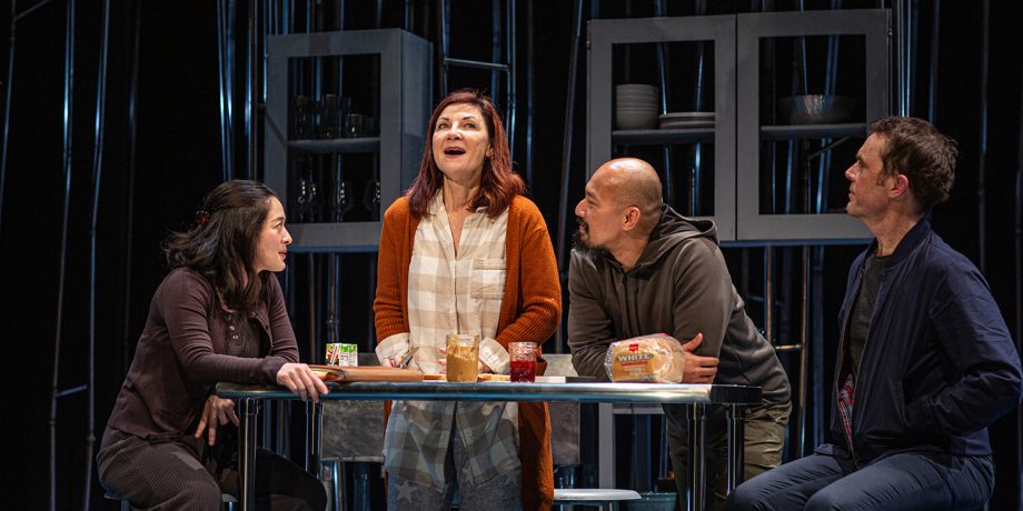 Letter Writer #2 (Kina Kantor), Sugar (Susi Damilano), Letter Writer #3 (Jomar Tagatac), and Letter Writer #1 (Mark Anderson Phillips) make peanut butter and jelly sandwiches together in 'Tiny Beautiful Things' at San Francisco Playhouse.