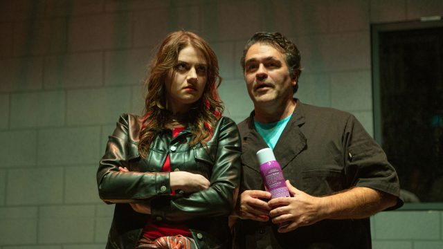 Anne (Ash Malloy*) receives some unsettling advice from hotel employee Hugbert (Christopher Reber*).