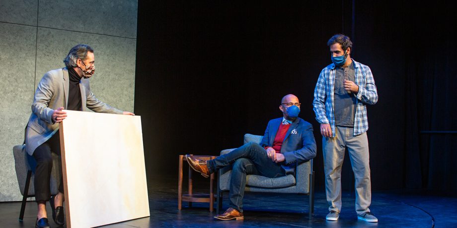 Serge (Johnny Moreno*) shows his recently purchased white painting to friends Marc (Jomar Tagatac*) and Yvan (Bobak Bakhtiari*).