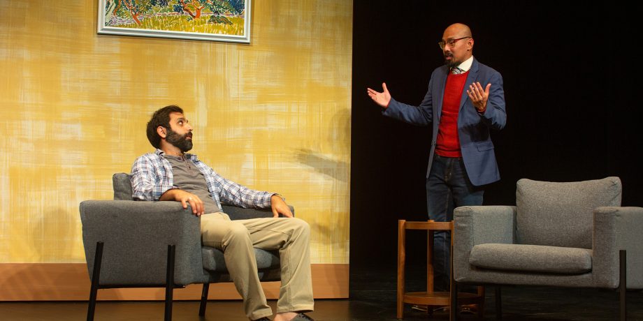 Yvan (Bobak Bakhtiari*) and Marc (Jomar Tagatac*) discuss their friend's unexpected purchase.