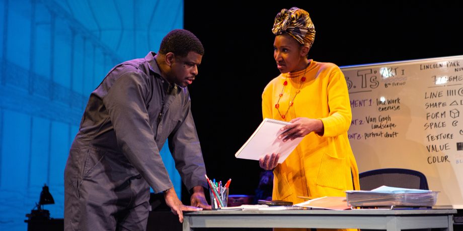 Ernest Hayes (Khary L. Moye*) discusses his daughter’s artwork with her art teacher, Ms. T. (Safiya Fredericks*).