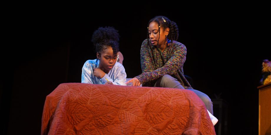 Leah (Anna Marie Sharpe, right) helps Davis (Jamella Cross*) study for an algebra test.