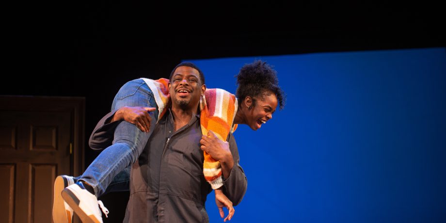 Ernest (Khary L. Moye*) and Davis (Jamella Cross*) share a father-daughter moment.