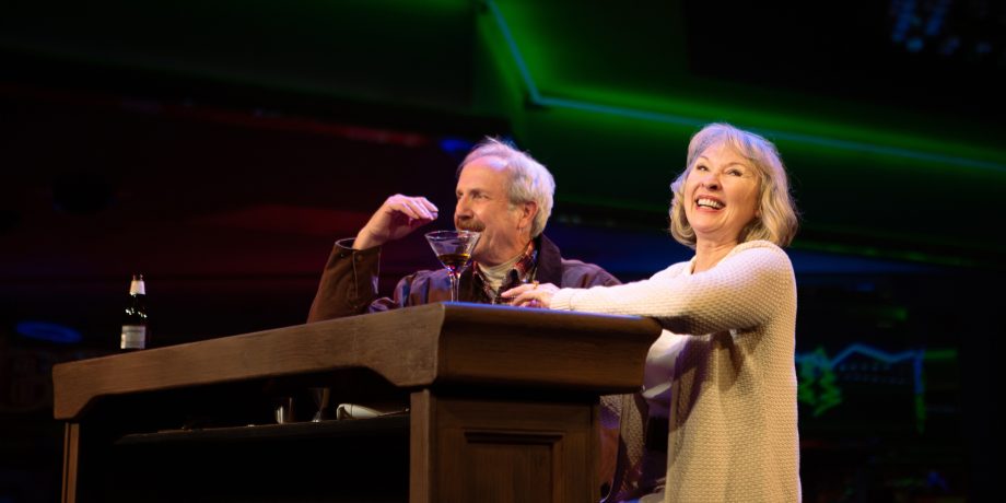 Jackie (Lorri Holt) meets Len (Dan Hiatt) at a bar in Lake Tahoe. Jackie (Lorri Holt) meets Len (Dan Hiatt) at a bar in Lake Tahoe.