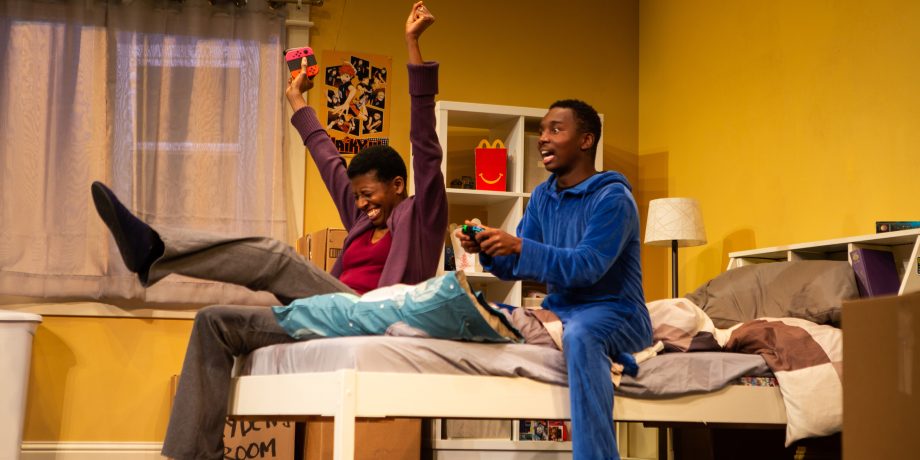 Jayden (Leon Jones) and his mom, Crystal (Velina Brown*), play a game on his console in 'The Great Khan' by Michael Gene Sullivan at San Francisco Playhouse.