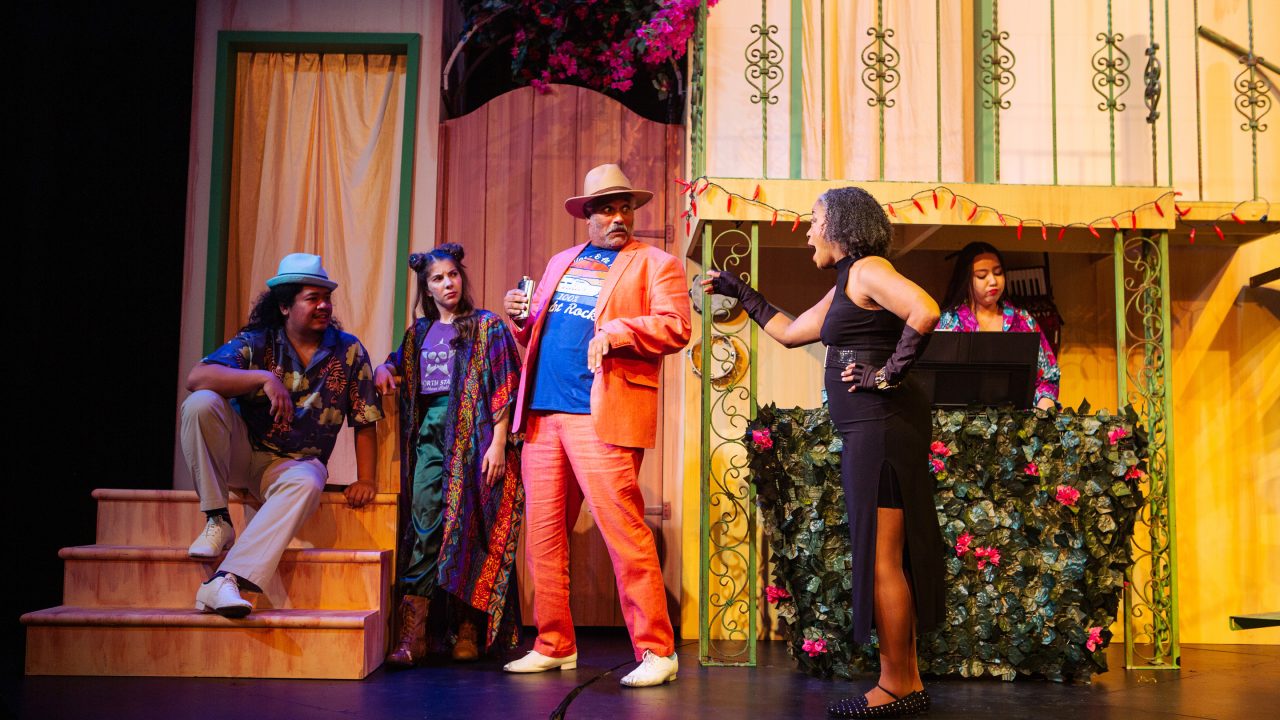 Maria (Cathleen Riddley*, front right) lovingly scolds Sir Toby (Michael Gene Sullivan*) for being a drunken rascal as Fabian (Tasi Alabastro), Feste (Sam Paley), and an ensemble member (Jamie Zee) look on in 'Twelfth Night' at San Francisco Playhouse.