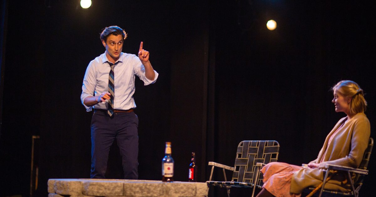 An intoxicated Kevin (Josh Schell*) talks about faith with Emily (Wera von Wulfen) in 'Heroes of the Fourth Turning' at San Francisco Playhouse.