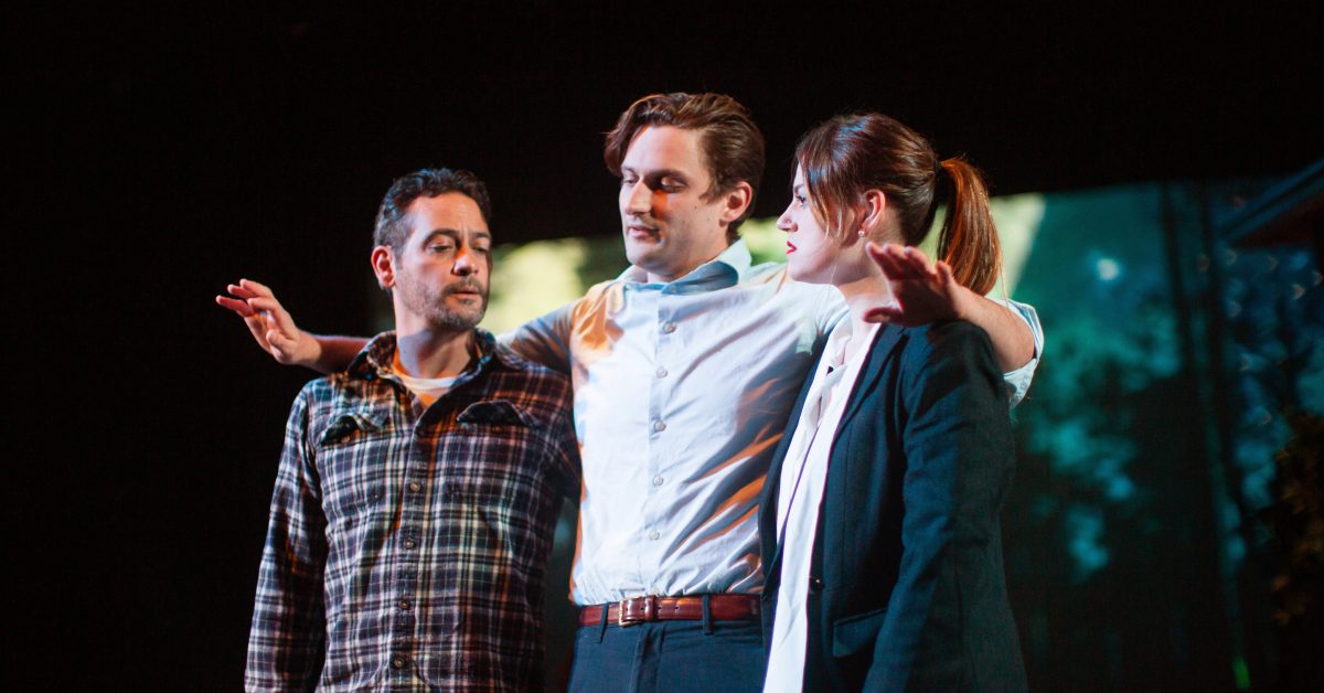 An emotional Kevin (Josh Schell*, center) is supported by former classmates Justin (Johnny Moreno*) and Teresa (Ash Malloy*) in 'Heroes of the Fourth Turning' at San Francisco Playhouse.