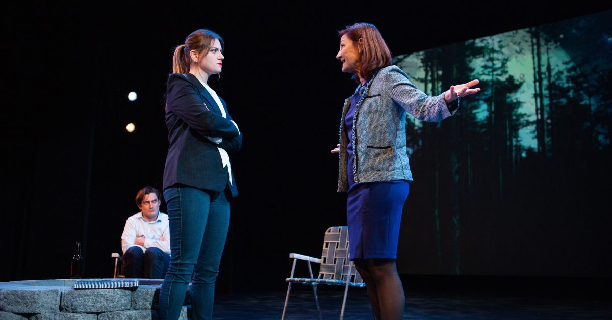 Gina (Susi Damilano*, right) tries to break through to her former student, Teresa (Ash Malloy*) as Kevin (Josh Schell*) looks on.