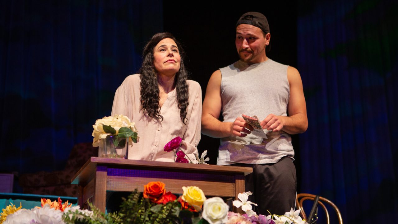 Cousins Yazmin Ortiz (Lara Maria*) and Elliot Ortiz (Xander DeAngeles*) discuss arrangements for a memorial in 'Water by the Spoonful' at San Francisco Playhouse.