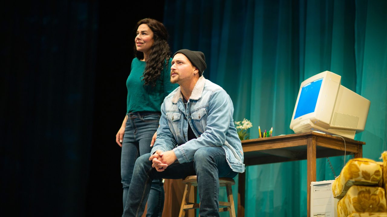 Yazmin Ortiz (Lara Maria*) and Elliot Ortiz (Xander DeAngeles*) discover Odessa's online community in 'Water by the Spoonful' at San Francisco Playhouse.