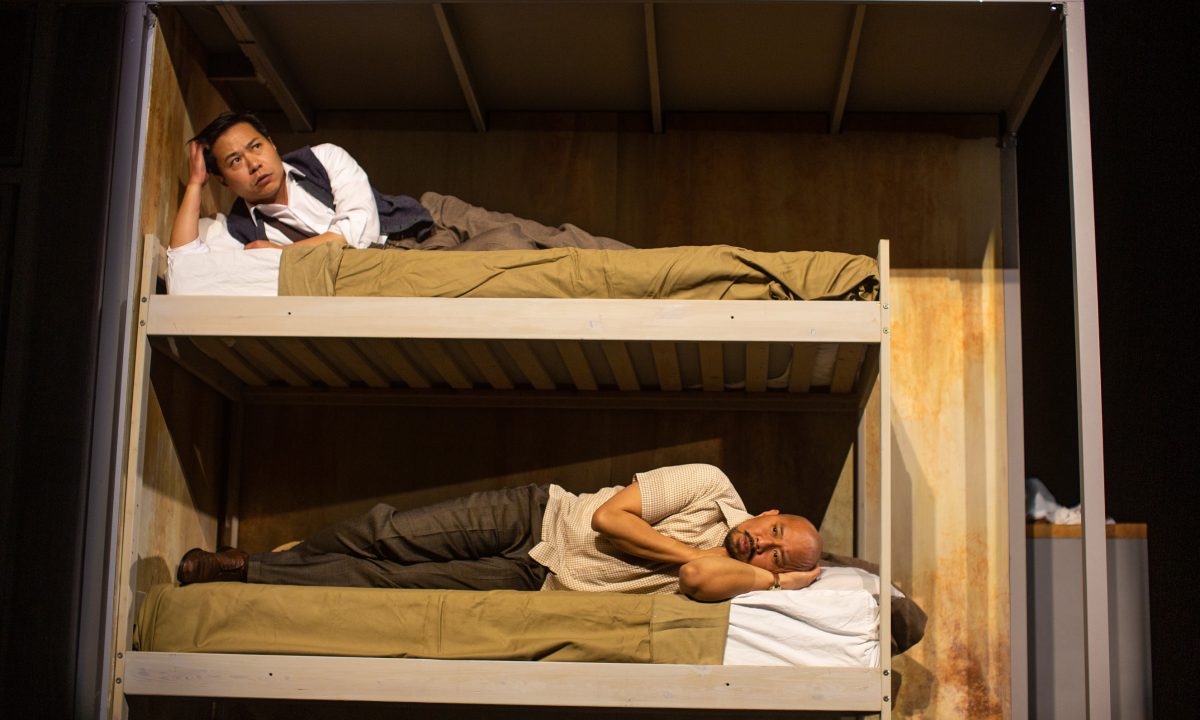 Poet (Will Dao*) and Harry (Jomar Tagatac*) memorize the backstories of their paper identities in 'The Paper Dreams of Harry Chin' at San Francisco Playhouse.