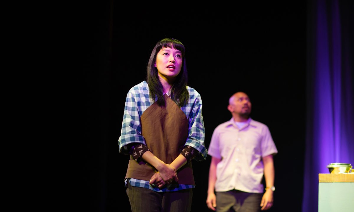 Yuet (Sharon Shao) and Harry (Jomar Tagatac*) relive a memory in 'The Paper Dreams of Harry Chin' at San Francisco Playhouse.