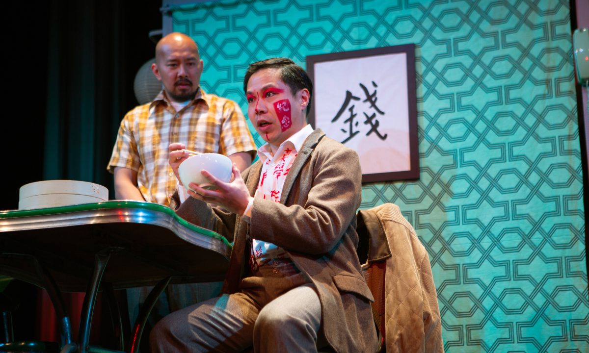 Harry (Jomar Tagatac*) welcomes the return of Poet (Will Dao*) in the Seventh Month in 'The Paper Dreams of Harry Chin' at San Francisco Playhouse.