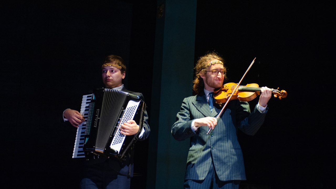 Dmitri Gaskin (left) as Moriz Godowsky, on accordion, and Matthew Stein (right) as Mayer Balsam, on violin, in 'Indecent' by Paula Vogel at San Francisco Playhouse. Production photography by Jessica Palopoli.