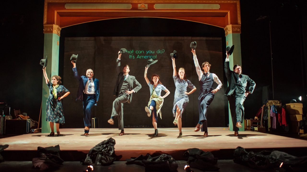 After arriving at Ellis Island, the troupe celebrates their entry into America (L-R): Vera (Rachel Botchan*), Otto (Victor Talmadge*), Lemml (Dean Linnard*), Chana (Malka Wallick*), Halina (Rivka Borek*), Avram (Billy Cohen*), and Mendel (Ted Zoldan). Production photography by Jessica Palopoli for 'Indecent' by Paula Vogel at San Francisco Playhouse.