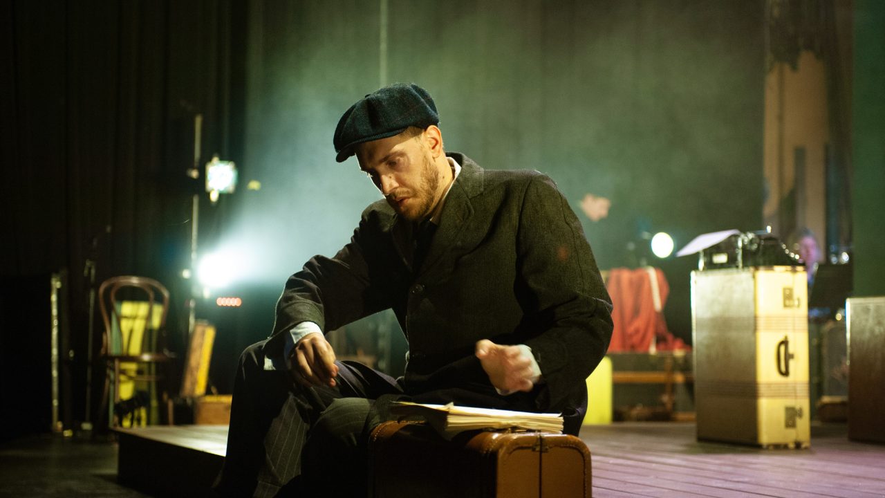 Lemml, as himself (Dean Linnard*), recalls watching the sun rise over Staten Island as he prepares his final goodbyes before his return to Poland. Production photography by Jessica Palopoli for 'Indecent' by Paula Vogel at San Francisco Playhouse.