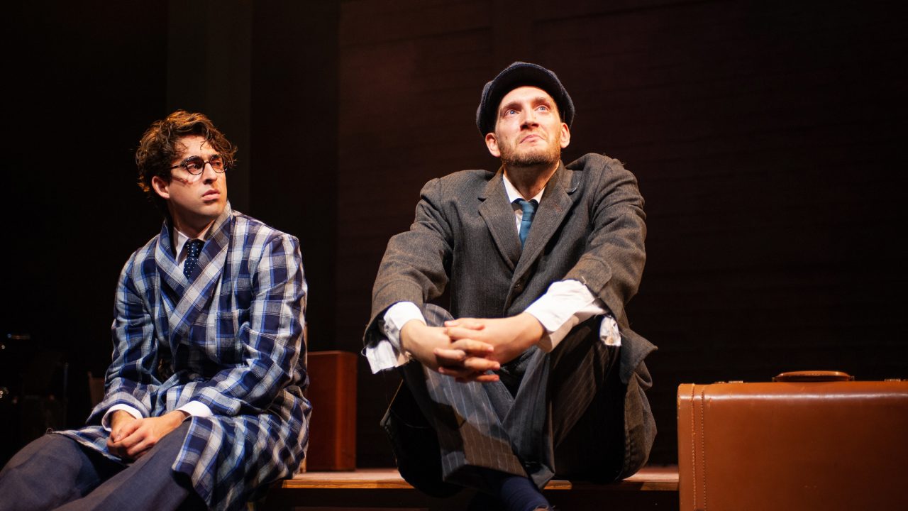 The troupe recreates a meeting between Lemml and Asch: Lemml, as himself (Dean Linnard*, right) confronts Asch, played by Avram (Billy Cohen*), about the cuts made to 'The God of Vengeance' and bids him farewell. Production photography by Jessica Palopoli for 'Indecent' by Paula Vogel at San Francisco Playhouse.