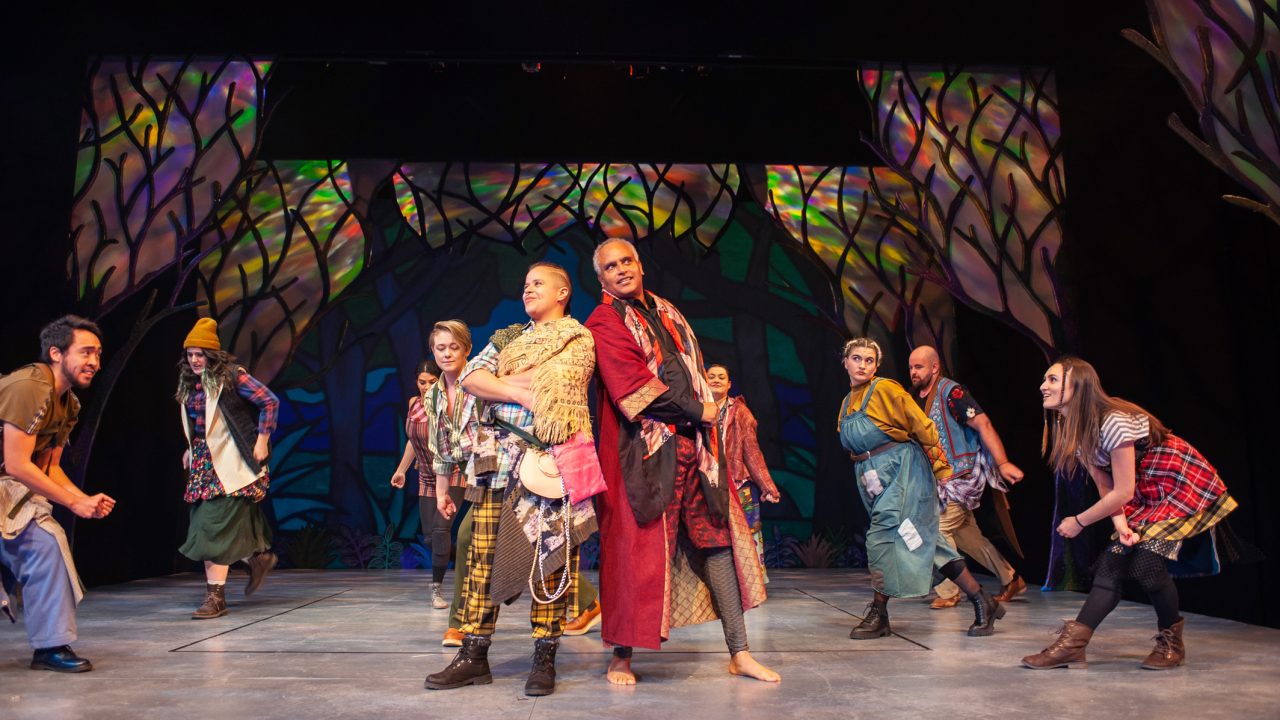 The Ardenites led by Jaques and Duke Senior (Center: DeanalÃs Arocho Resto and Michael Gene Sullivan) extoll about the virtues of their forest community in San Francisco Playhouse's musical version of "As You Like It," performing now through January 14, 2023.