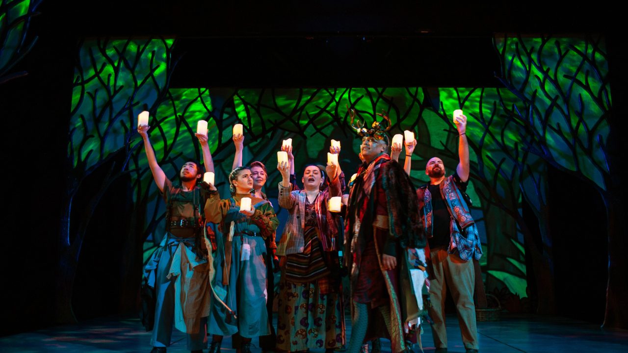 Exiles find community in the forest of Arden in San Francisco Playhouse's musical version of "As You Like It," performing now through January 14, 2023.