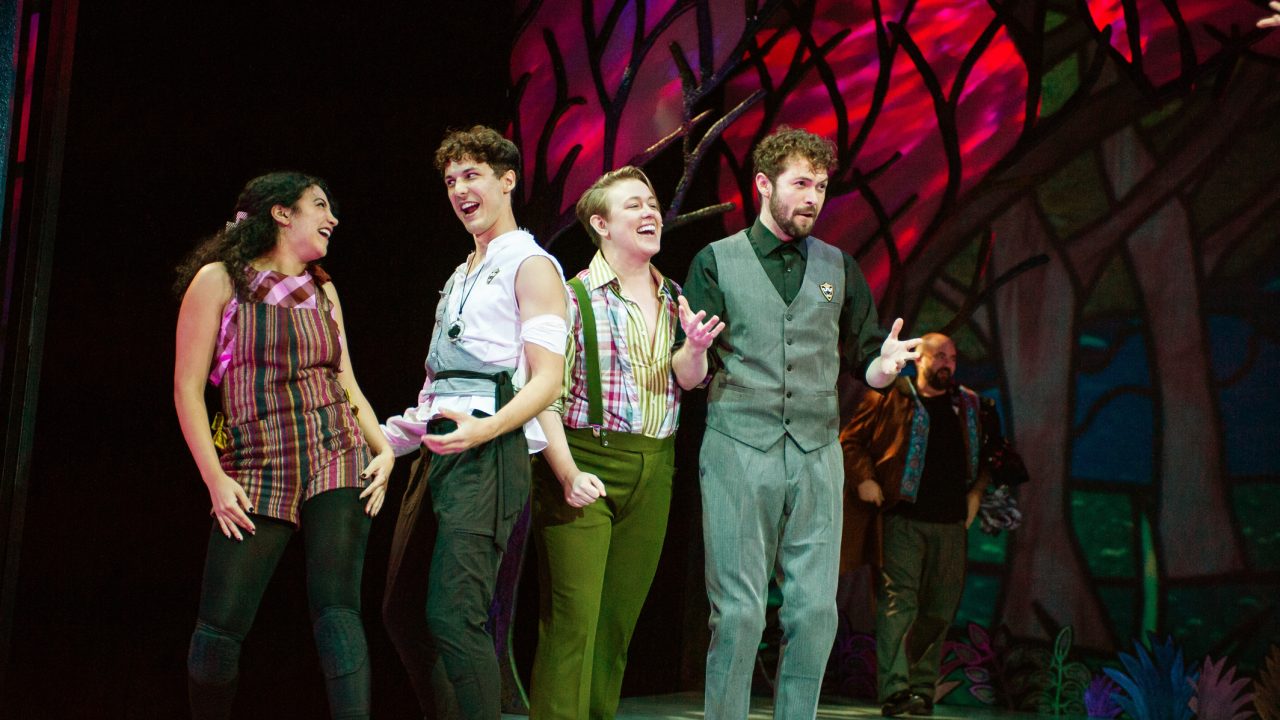 Silvia (Sophia Alawi), Orlando (Nikita Burshteyn), Andy (Ezra Reaves), and Oliver (Ryan Torres) expound on the joys of love in San Francisco Playhouse's musical version of "As You Like It," performing now through January 14, 2023.