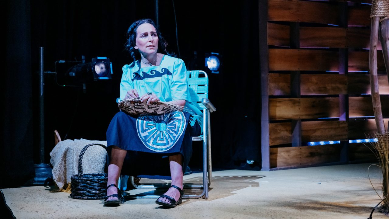 Virginia (Lisa Ramirez) makes a basket in San Francisco Playhouse's World Premiere of "Cashed Out," performing January 26 - February 25.