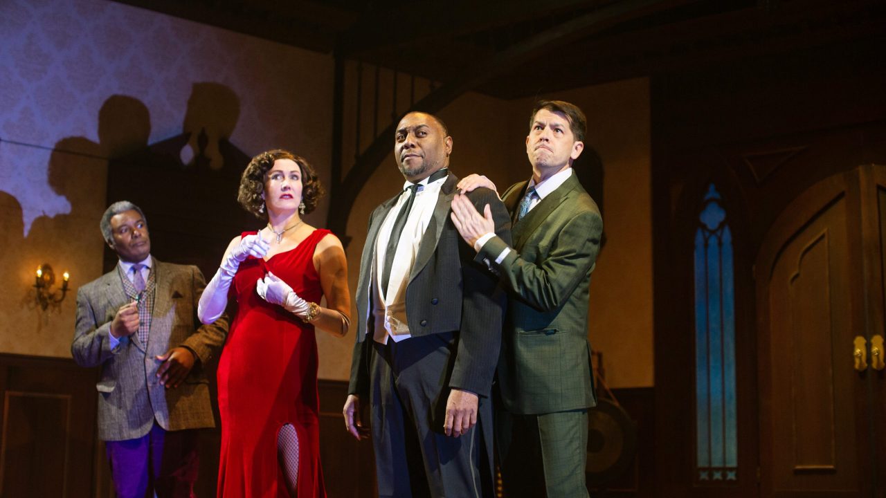 Miss Scarlet (Courtney Walsh), Wadsworth (Dorian Lockett), and Mr. Green (Greg Ayers) suspect something suspicious is afoot in San Francisco Playhouse's "Clue," performing March 9 - April 22.