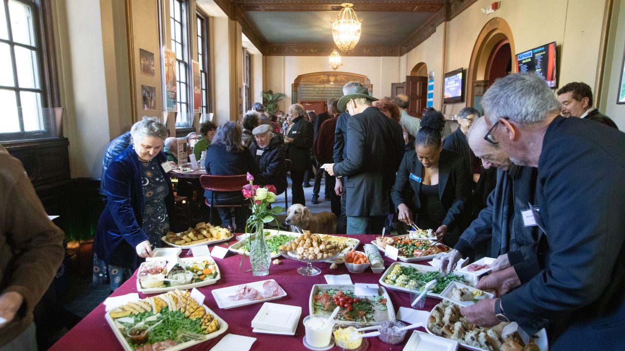 Supporters and friends enjoy refreshments.