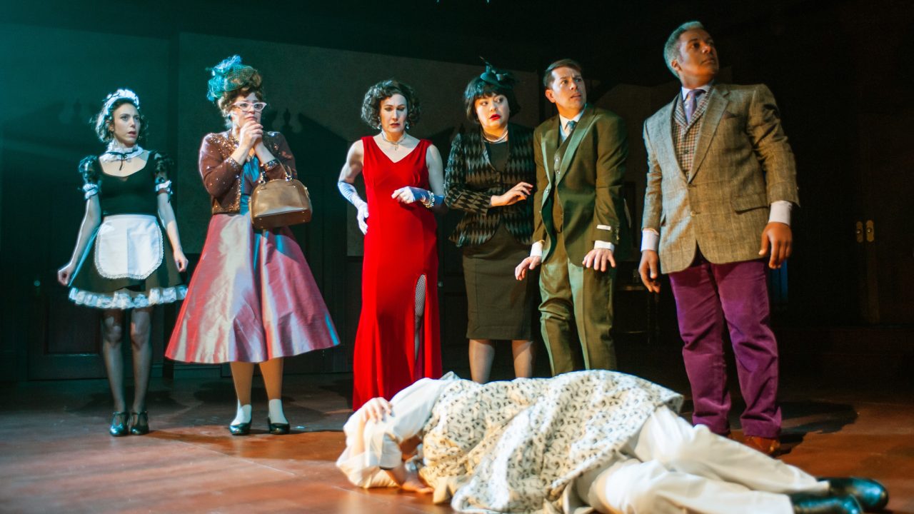 Yvette (Margherita Ventura), Mrs. Peacock (Stacy Ross), Miss Scarlet (Courtney Walsh), Mrs. White (Renee Rogoff), and Mr. Green (Greg Ayers) discover the cook (Eiko Yamamoto) dead in San Francisco Playhouse's "Clue," performing March 9 - April 22.