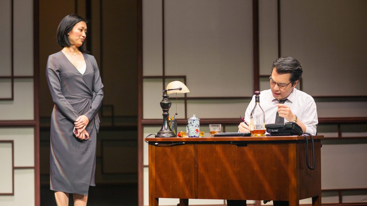 Vice minister Xi Yan (Nicole Tung) receives instructions from her boss minister Cai Guoliang (Alex Hsu) in San Francisco Playhouse's "Chinglish," performing May 4 - June 10.