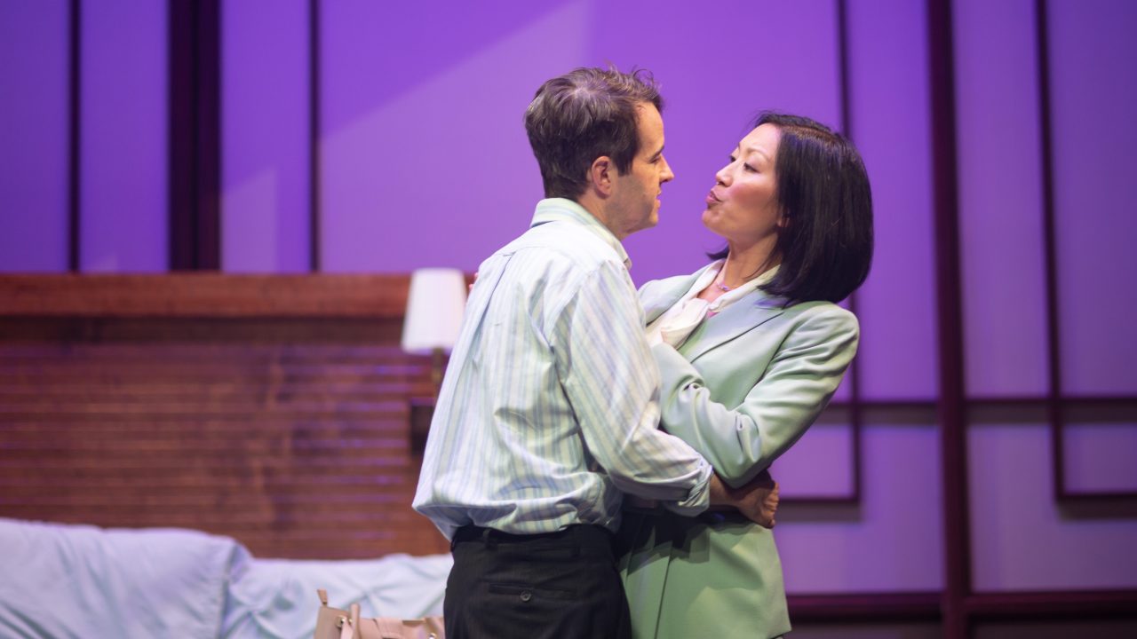 American businessman Daniel Cavanaugh (Michael Barrett Austin) has an encounter with vice minister Xi Yan (Nicole Tung) in San Francisco Playhouse's "Chinglish," performing May 4 - June 10.