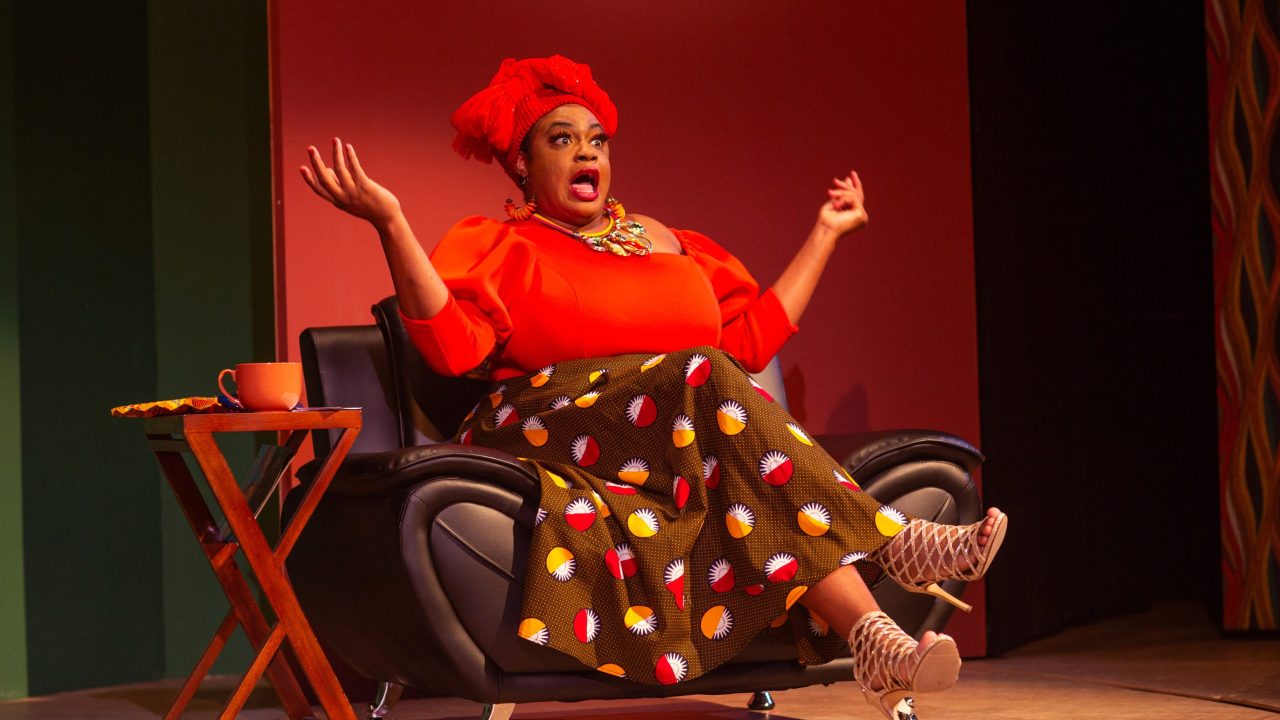 Adenikeh (Tanika Baptiste), the Oprah of Lagos, dishes on her talk show in San Francisco Playhouse's "Nollywood Dreams," performing September 28 - November 4, 2023.