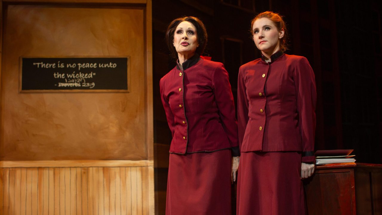 Arvide (Jill Slyer) and Sarah (Abigail Esfira Campbell) work at the Save-A-Soul Mission in San Francisco Playhouse's "Guys and Dolls," performing November 16, 2023 - January 13, 2024.