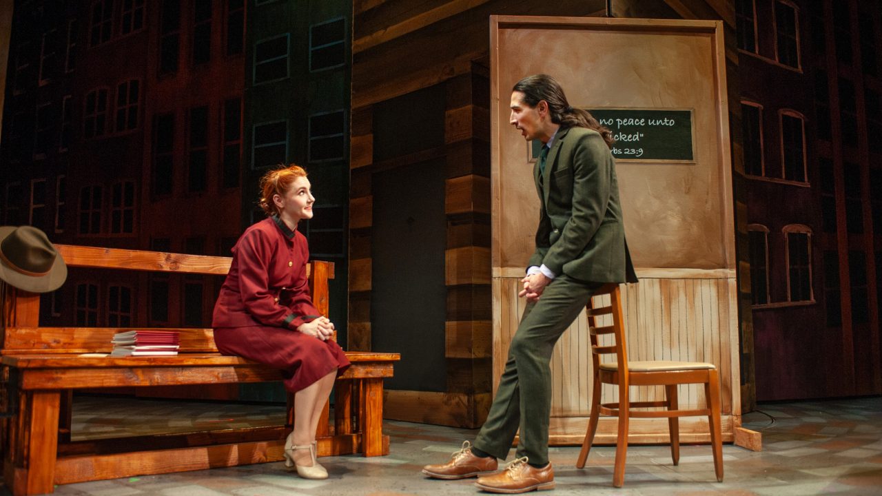 Sarah (Abigail Esfira Campbell) greets Sky (David Toshiro Crane) in San Francisco Playhouse's "Guys and Dolls," performing November 16, 2023 - January 13, 2024.